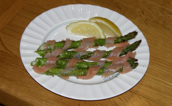 Asparagus wrapped in smoked salmon strips