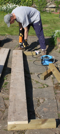 Making an asparagus raised bed from old planks